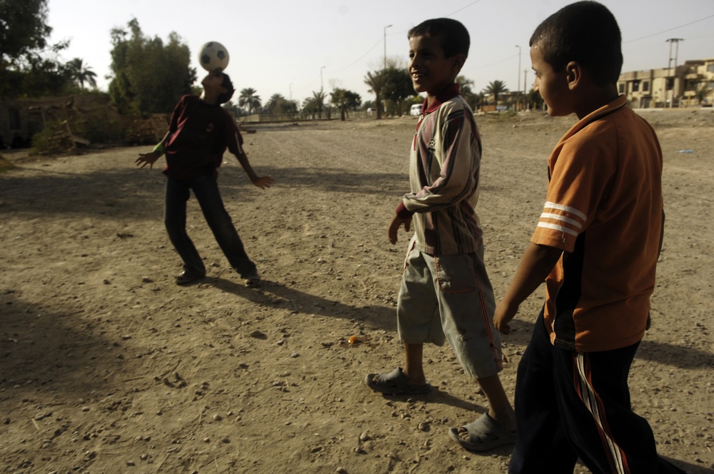 Iraqi Children Play Soccer
