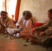 An Iraqi Man Shows Marine His Wound