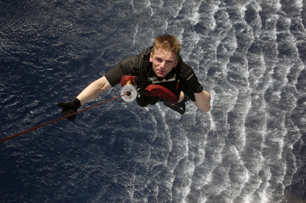 Search and Rescue swimmers on USS Blue Ridge
