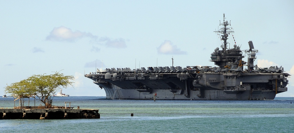 USS Kitty Hawk heads out to open sea