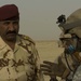 Iraqi Soldiers lead Americans to explosive find