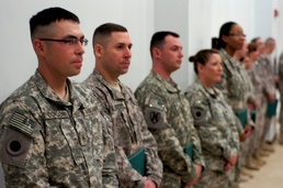 Deployed troops conduct mass reenlistment