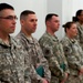 Deployed troops conduct mass reenlistment