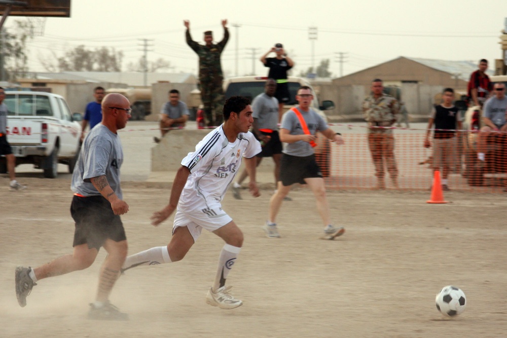 MND-B Soldiers, IA soldiers build friendships through soccer