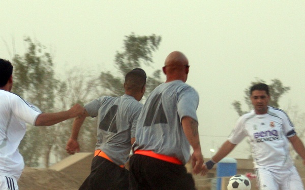 MND-B Soldiers, IA soldiers build friendships through soccer