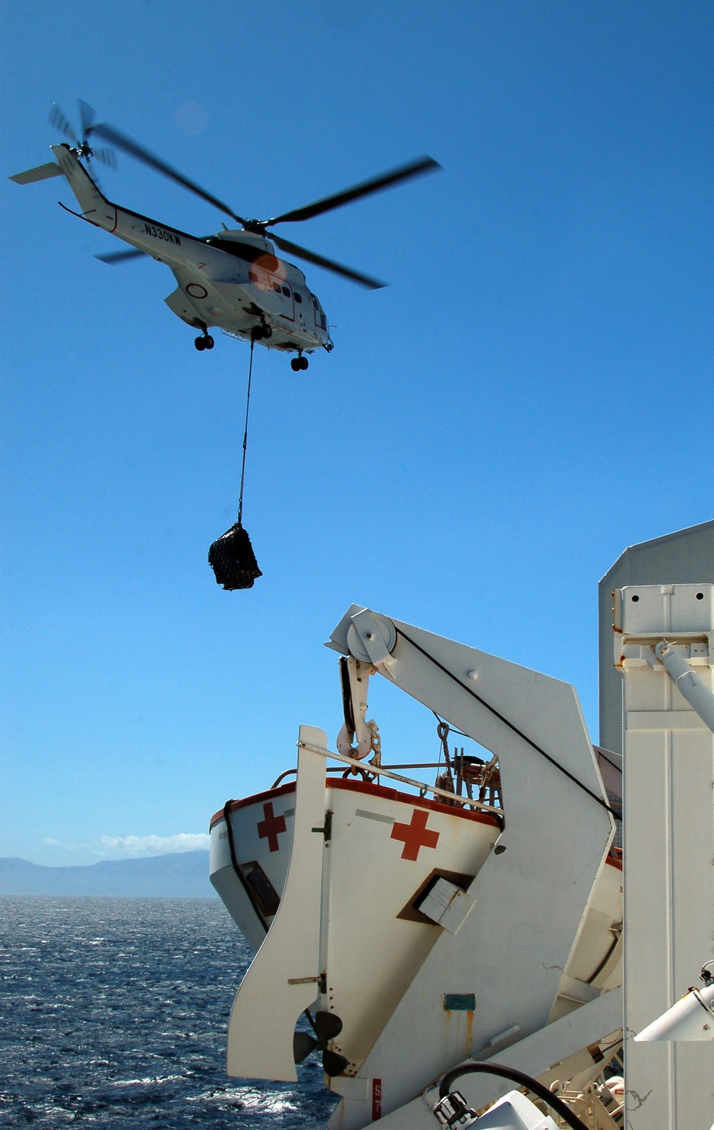 Super Puma delivers the goods to USNS Mercy