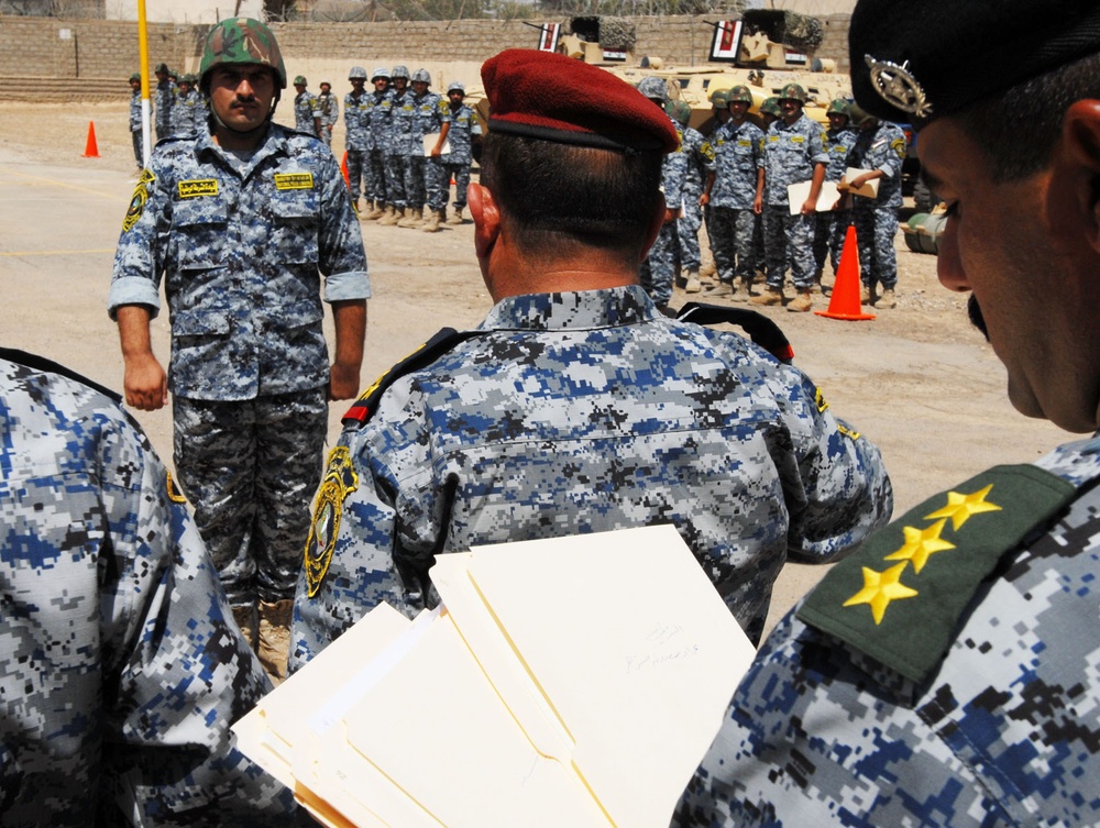 Iraqi National Police 1st Mech. Bde. NPs graduate 1st BCT ISF Iron Claw Academy