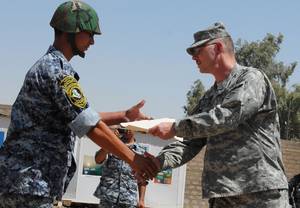 Iraqi National Police 1st Mech. Bde. NPs graduate 1st BCT ISF Iron Claw Academy