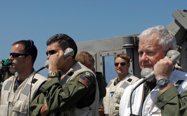 Acting as a landing signal officer