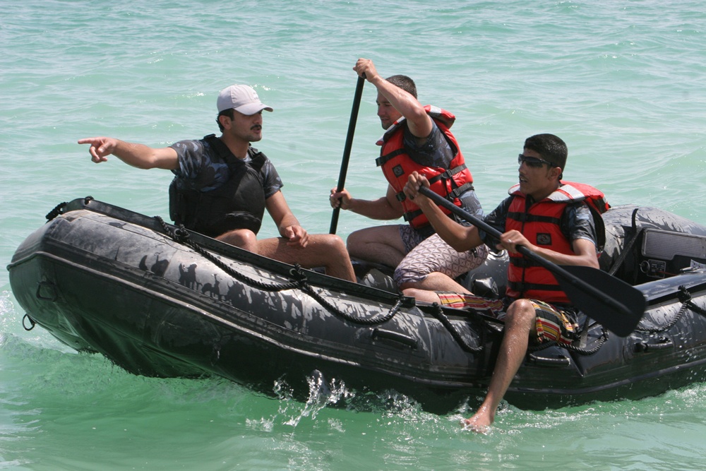 Iraqi police shake, rattle and row