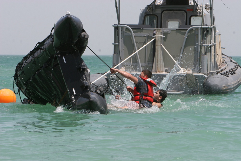 Iraqi police shake, rattle and row