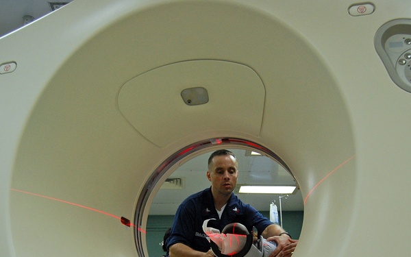 Assisting patient with CT-scan