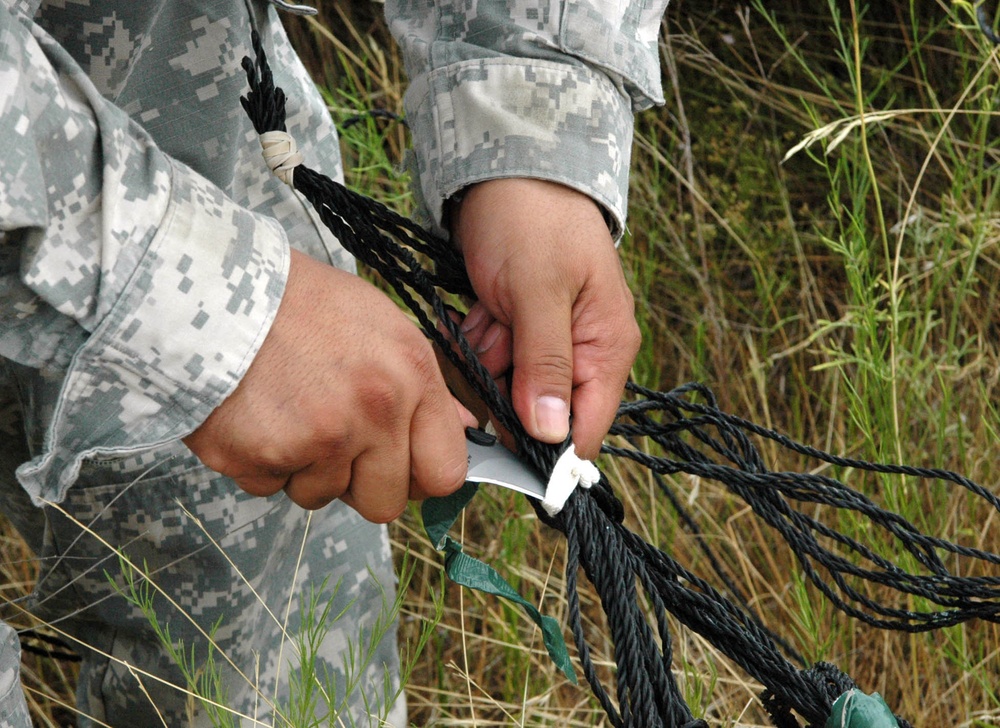 'Greywolf' troops scan the sky for resupply