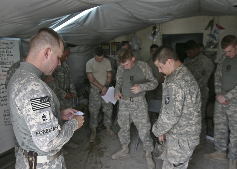 Soldiers interrogate streets of Baghdad: Route clearance team motivated by dangerous job