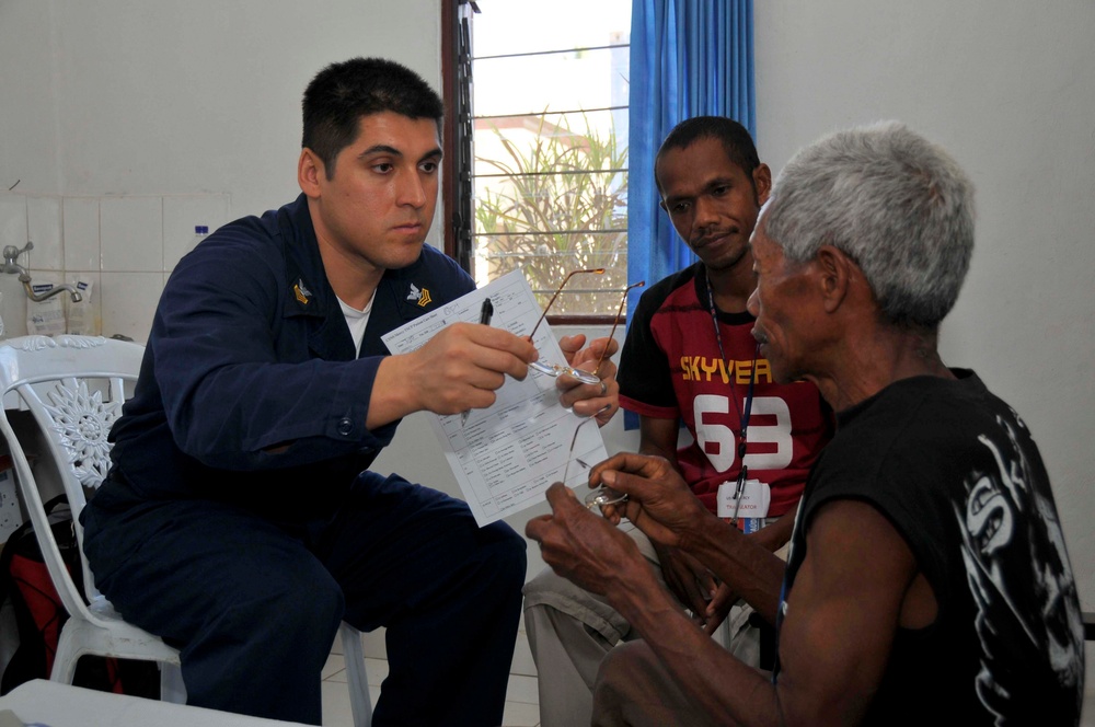 Sailor Performs Eye Exam on USNS Mercy
