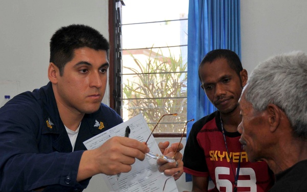 Sailor Performs Eye Exam on USNS Mercy