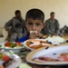 Iraqi Boy Eats Lunch