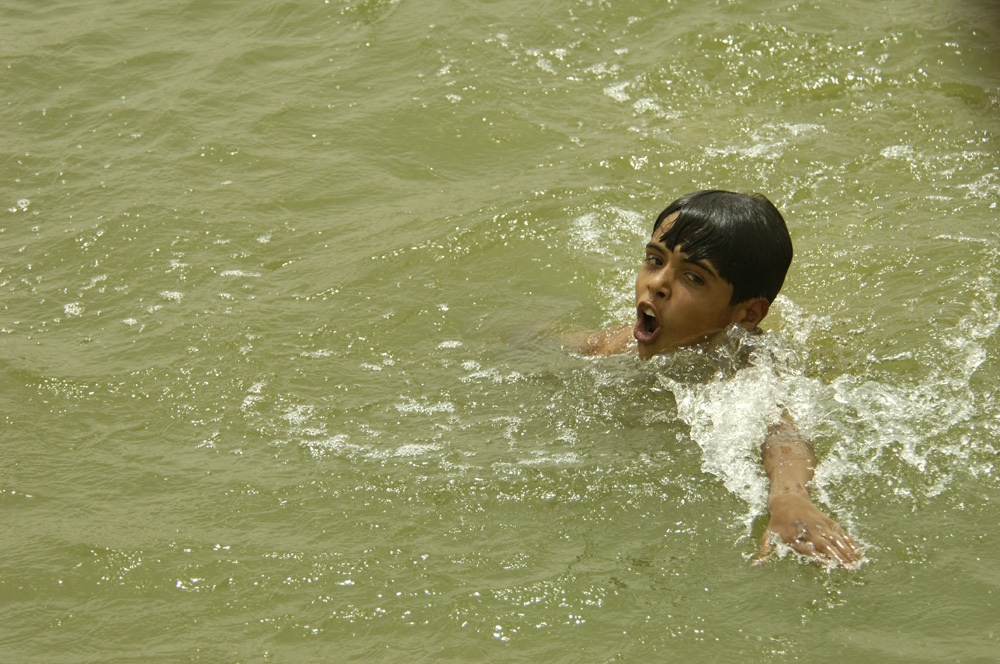 Iraqi Boy Swims in River Along Route Florida, Sadr City
