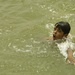 Iraqi Boy Swims in River Along Route Florida, Sadr City