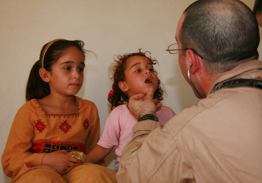 IA, Marines combine efforts during medical engagement