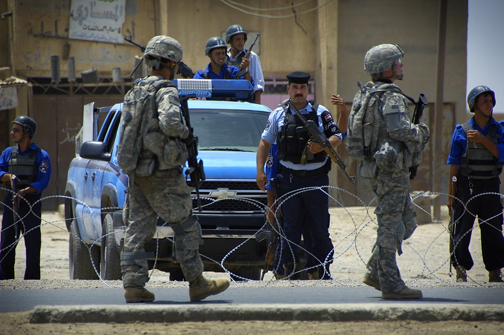 Iraqi Police and U.S. Soldiers Secure Opening of New Police Station