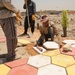 Iraqi Contractor Places New Tile in Park