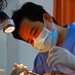 Vietnamese health care professionals work with American counterparts