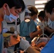 Vietnamese health care professionals work with American counterparts