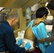 Vietnamese health care professionals work with American counterparts