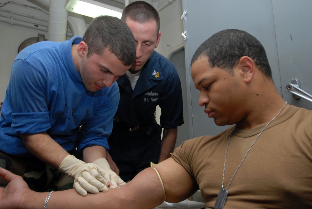 USS Nassau Sailors learn IV skills
