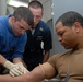 USS Nassau Sailors learn IV skills