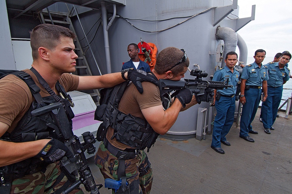 Service members work in Indonesia