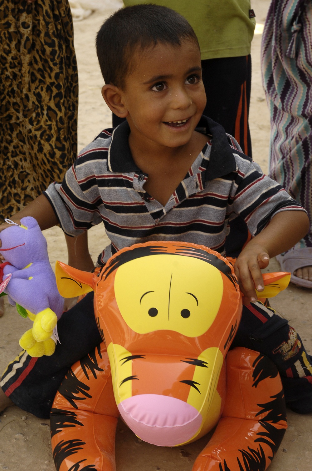 Iraqi Children Receive Toys From Iraqi Soldiers