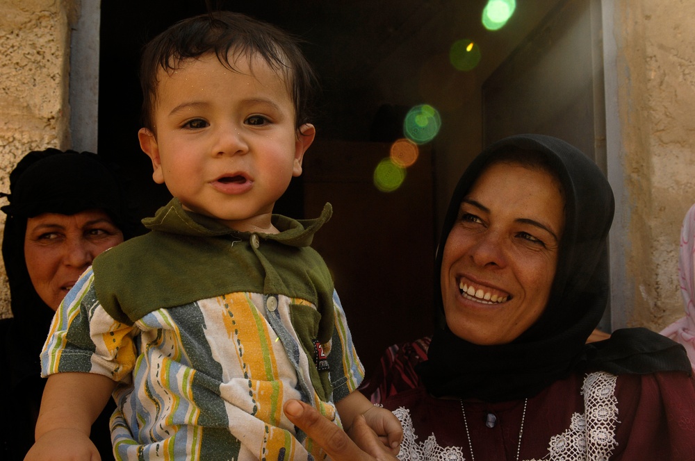 Iraqi Children Receive Toys From Iraqi Soldiers