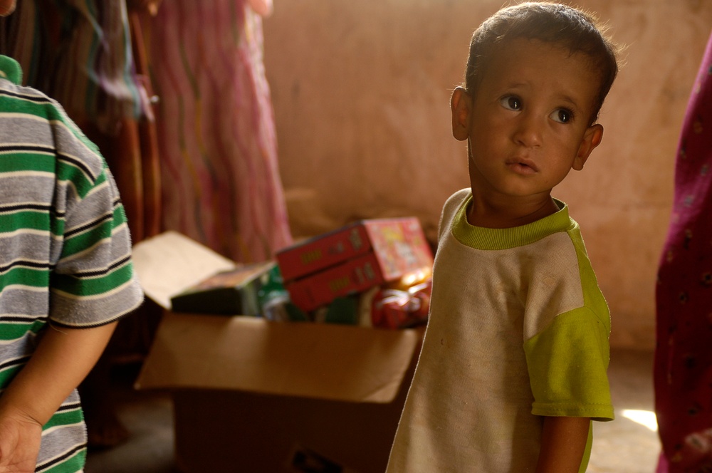 Iraqi Children Receive Toys From Iraqi Soldiers