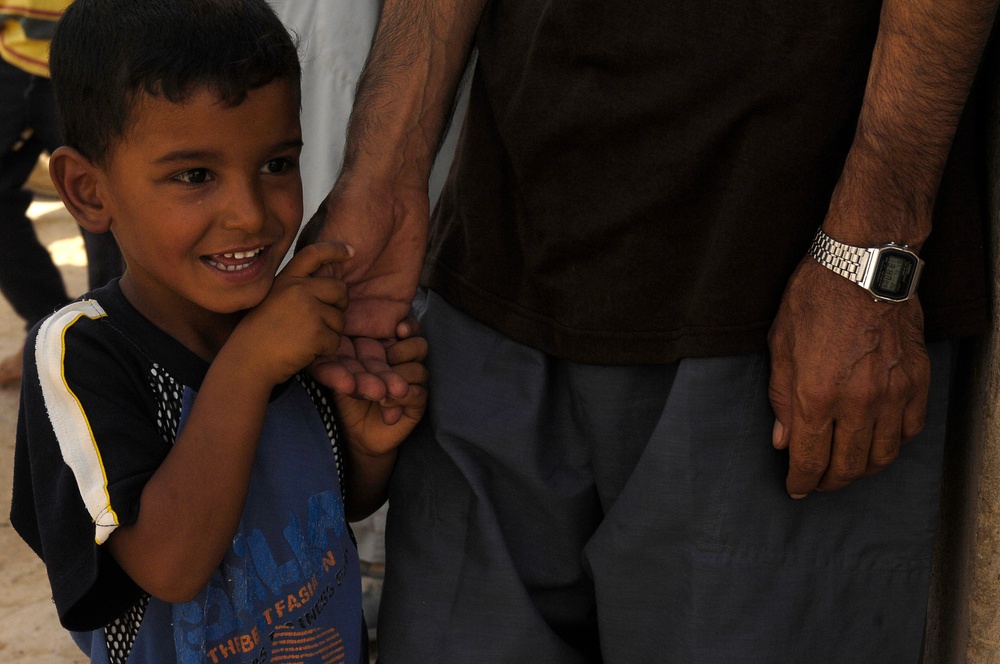 Iraqi Children Receive Toys From Iraqi Soldiers