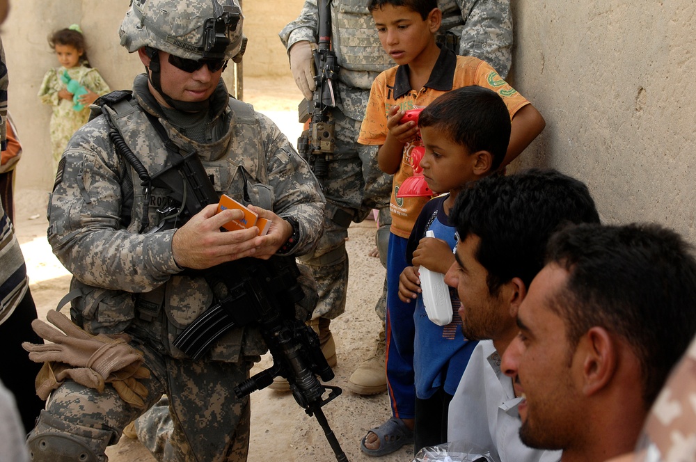 Iraqi Children Receive Toys From Iraqi Soldiers