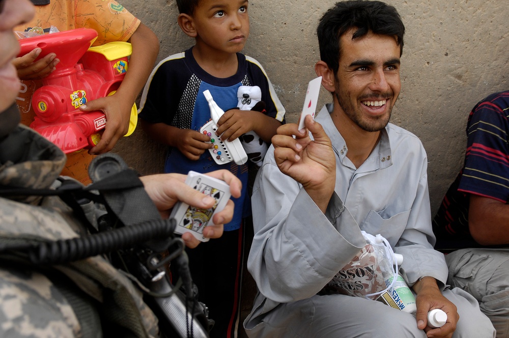 Iraqi Children Receive Toys From Iraqi Soldiers