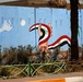 Sadr City walls earn colorful makeover