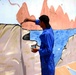 Sadr City walls earn colorful makeover