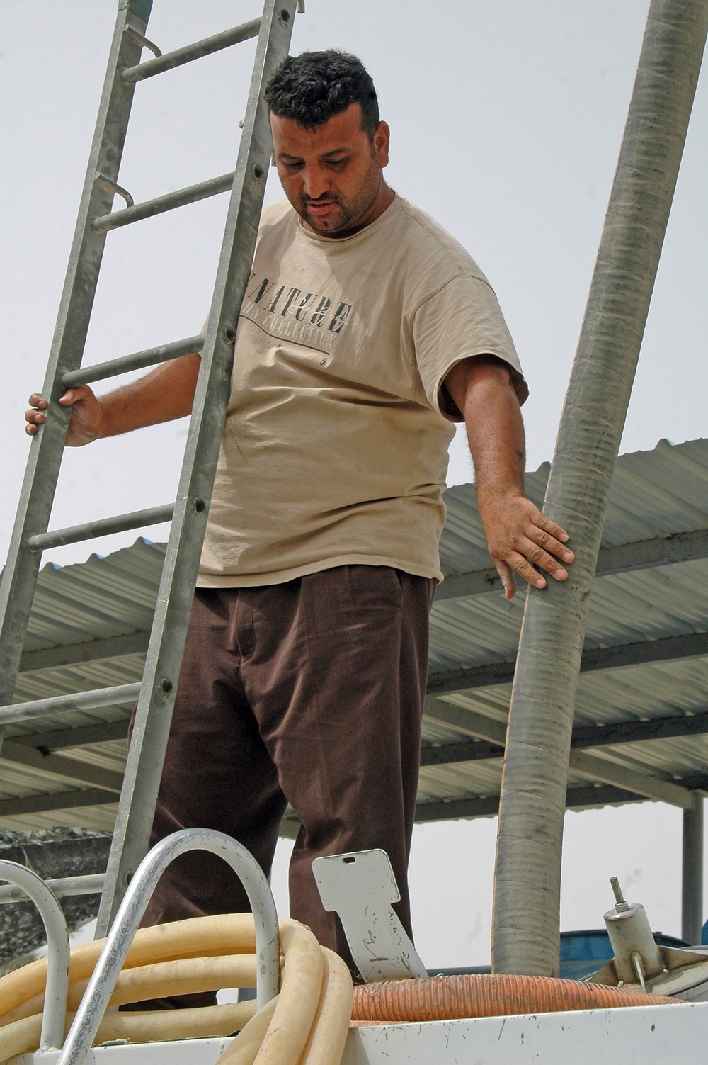 Officials open water distribution site, fill BWA trucks for delivery