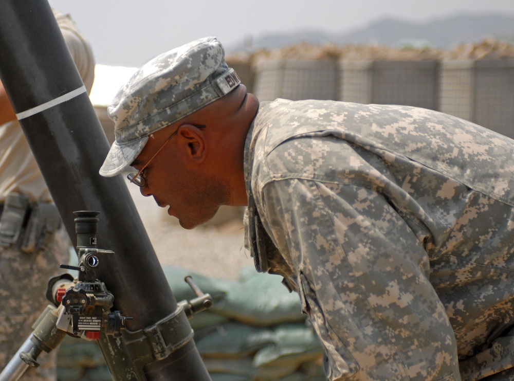 Field Artillery Soldiers man the gun line