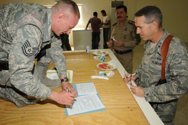 Gen. Bash Reenlists Airmen