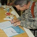 Gen. Bash Reenlists Airmen