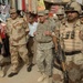 U.S. Army Gen. David Petraeus Tours Market in Abu Ghraib