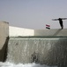 Iraqi Police Take a Swim in New Cistern