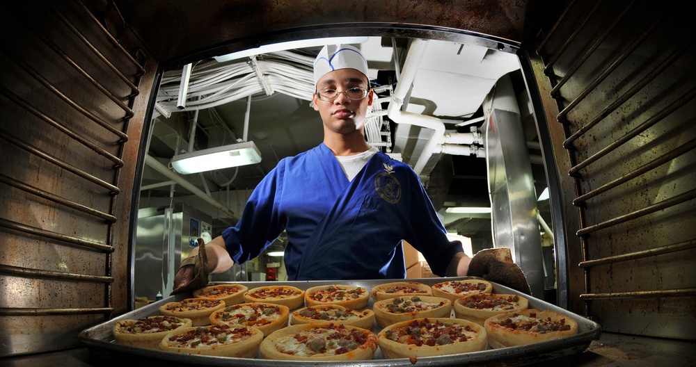 Sailor Prepares Pizza Aboard USS Abraham Lincoln