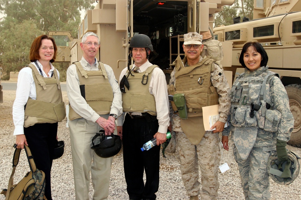 Dr. Patricia Kavanagh (left), assistant professor at Downstate Medical Center in Brooklyn, NY, stands with fellow doctors and collegues on Camp Ramadi in Iraq.  She and Dr. Michael Carey (2nd from left), chief of neurology at the Veteran's Administration