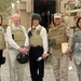 Dr. Patricia Kavanagh (left), assistant professor at Downstate Medical Center in Brooklyn, NY, stands with fellow doctors and collegues on Camp Ramadi in Iraq.  She and Dr. Michael Carey (2nd from left), chief of neurology at the Veteran's Administration