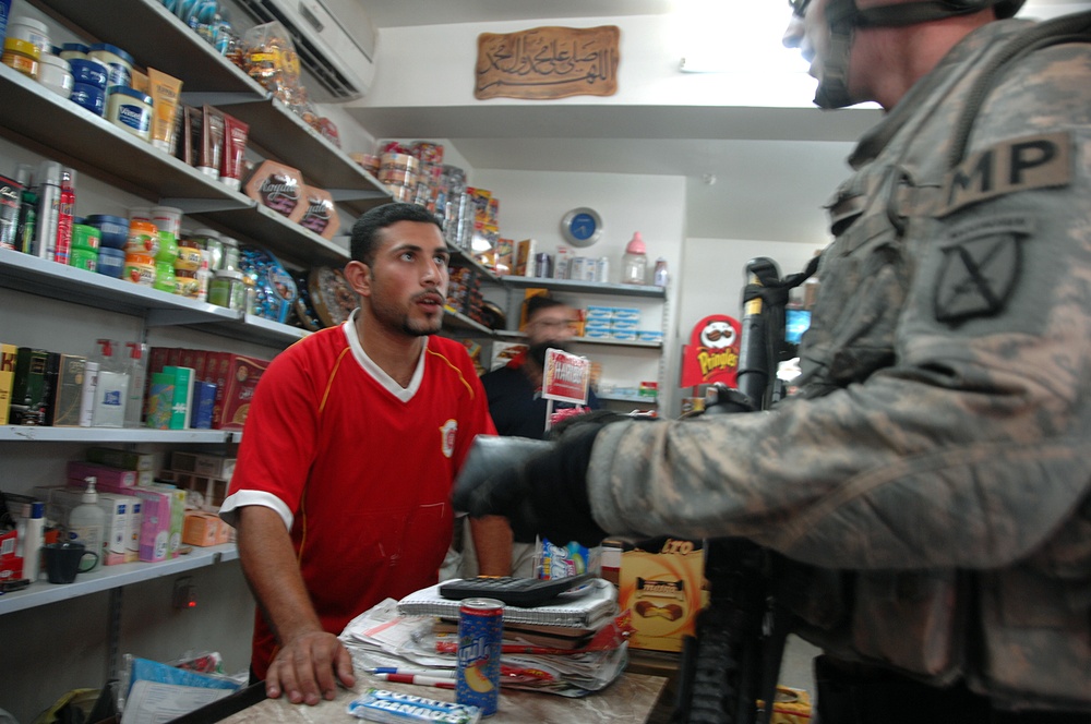 U.S. Soldiers Purchase Snacks at Convenience Store